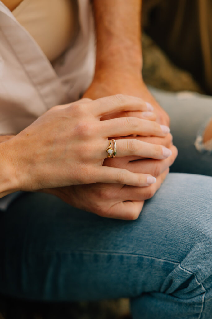engagement photo ring shot: stack your hands together so her ring is on top. 